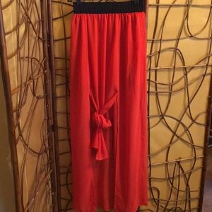 Red-orange colored skirt